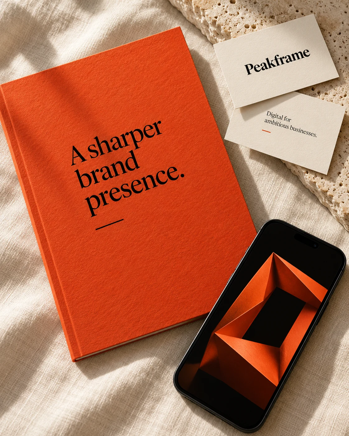 Orange Peak Frame brand booklet, business cards and smartphone concept
