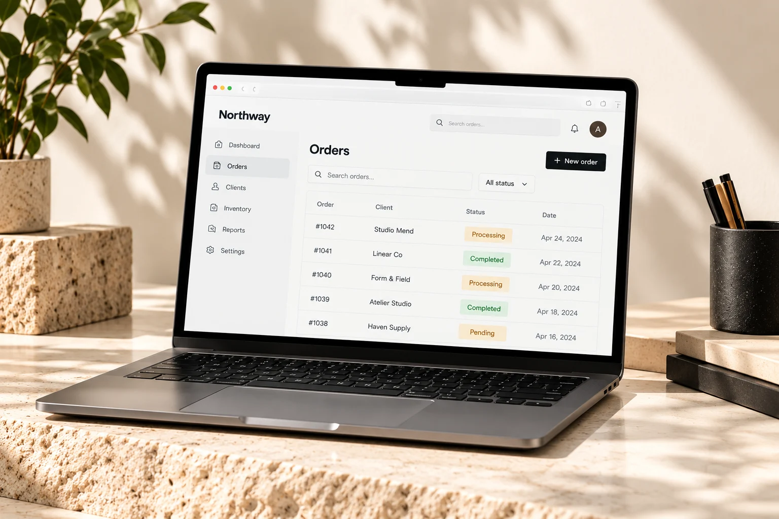 Custom software concept showing orders on a laptop